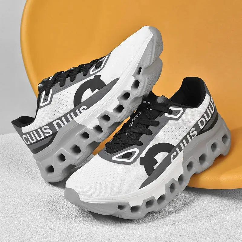 Men's off-road running shoes - white/gray mesh with black laces and a chunky hollow outsole (pair)
