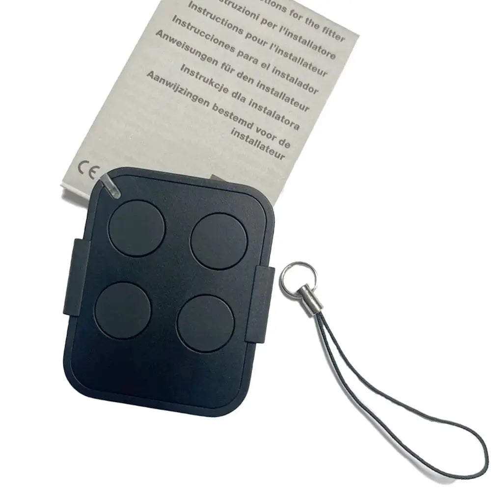Garage door remote control by Simples Market, black handheld with four round buttons and a keychain strap.