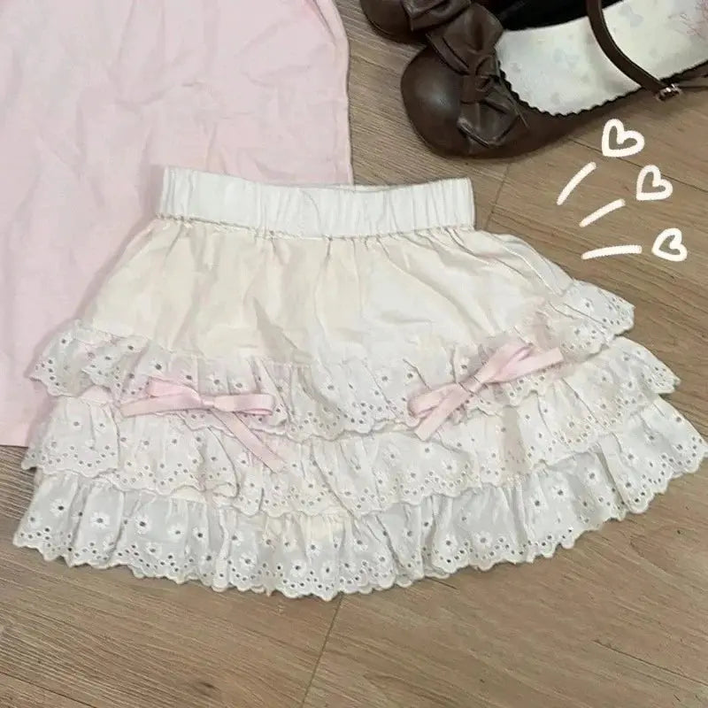 Lolita style cake skirt in white lace with pink bows and layered ruffles for women