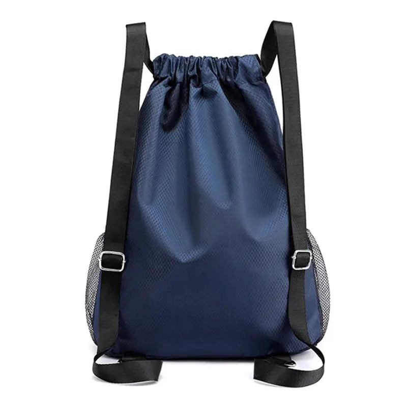 Drawstring backpack in navy blue with black straps and mesh side pockets