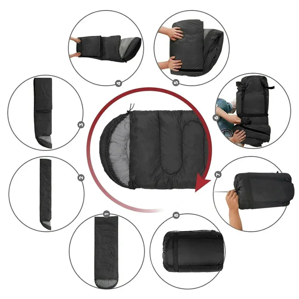 Camping sleeping bag, lightweight four-season mummy style, black, shown compacted into a carry bag.