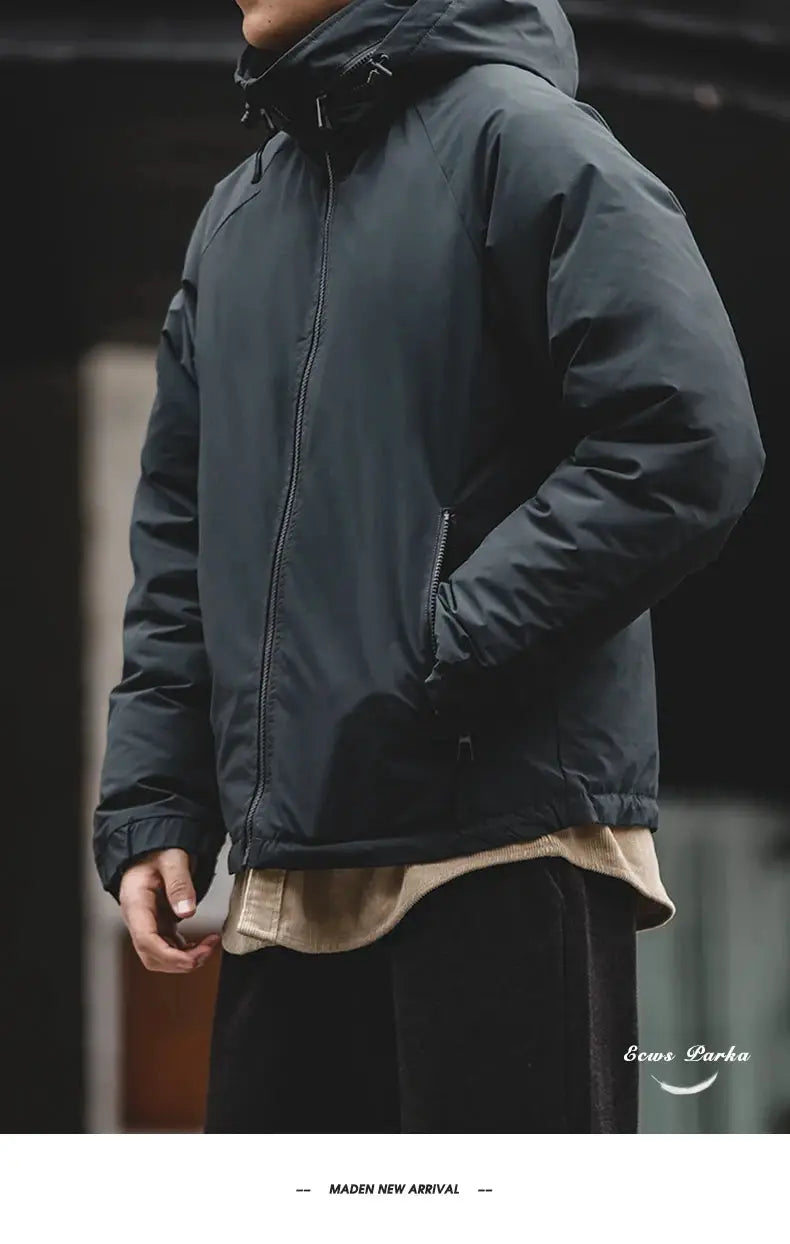 Maden hooded men's down jacket in black with front zip and side pockets, matte-glossy fabric parka.