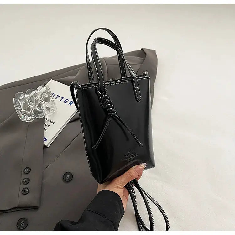 Simples Market black PU leather mini crossbody bag for women with top handles and knotted strap detail