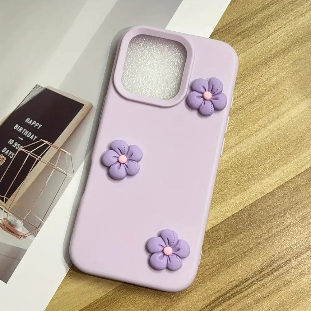 iPhone case by Simples Market; lavender matte silicone with 3D purple flower embellishments