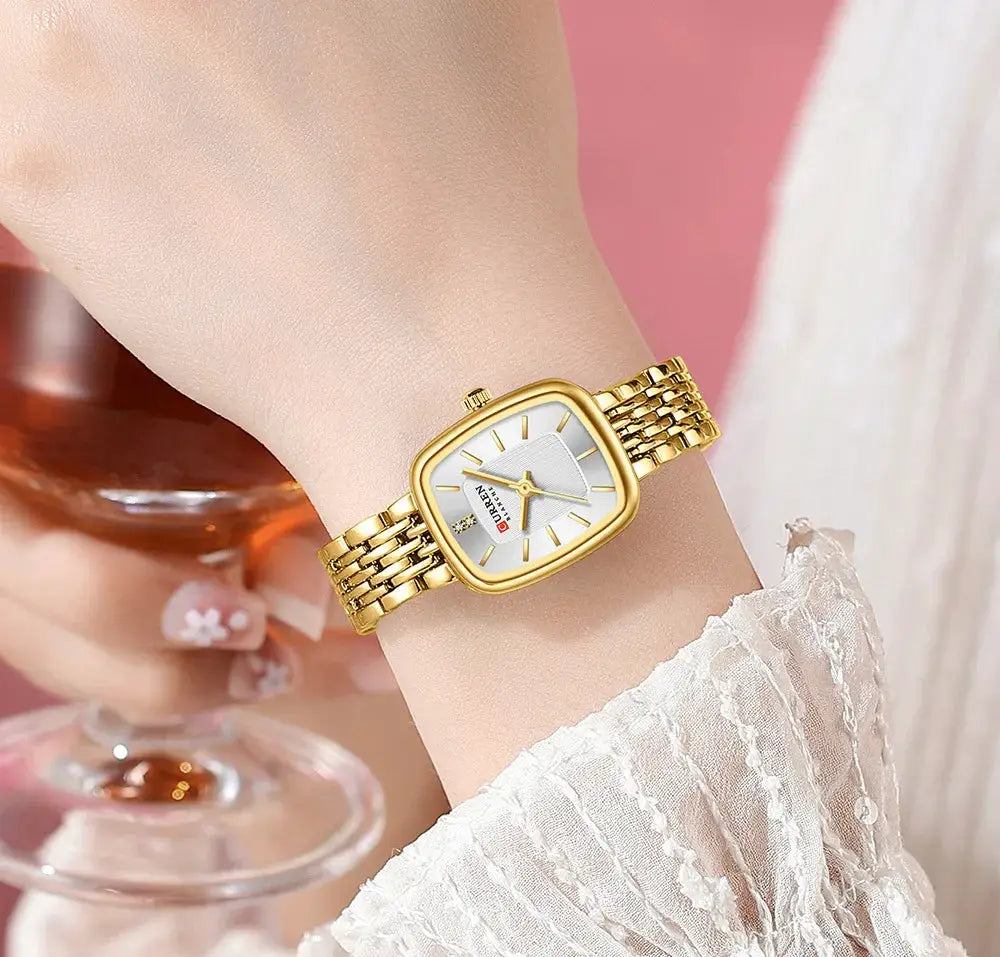 CURRN 9093 women's quartz watch, gold-tone stainless-steel bracelet, silver dial with diamond accents