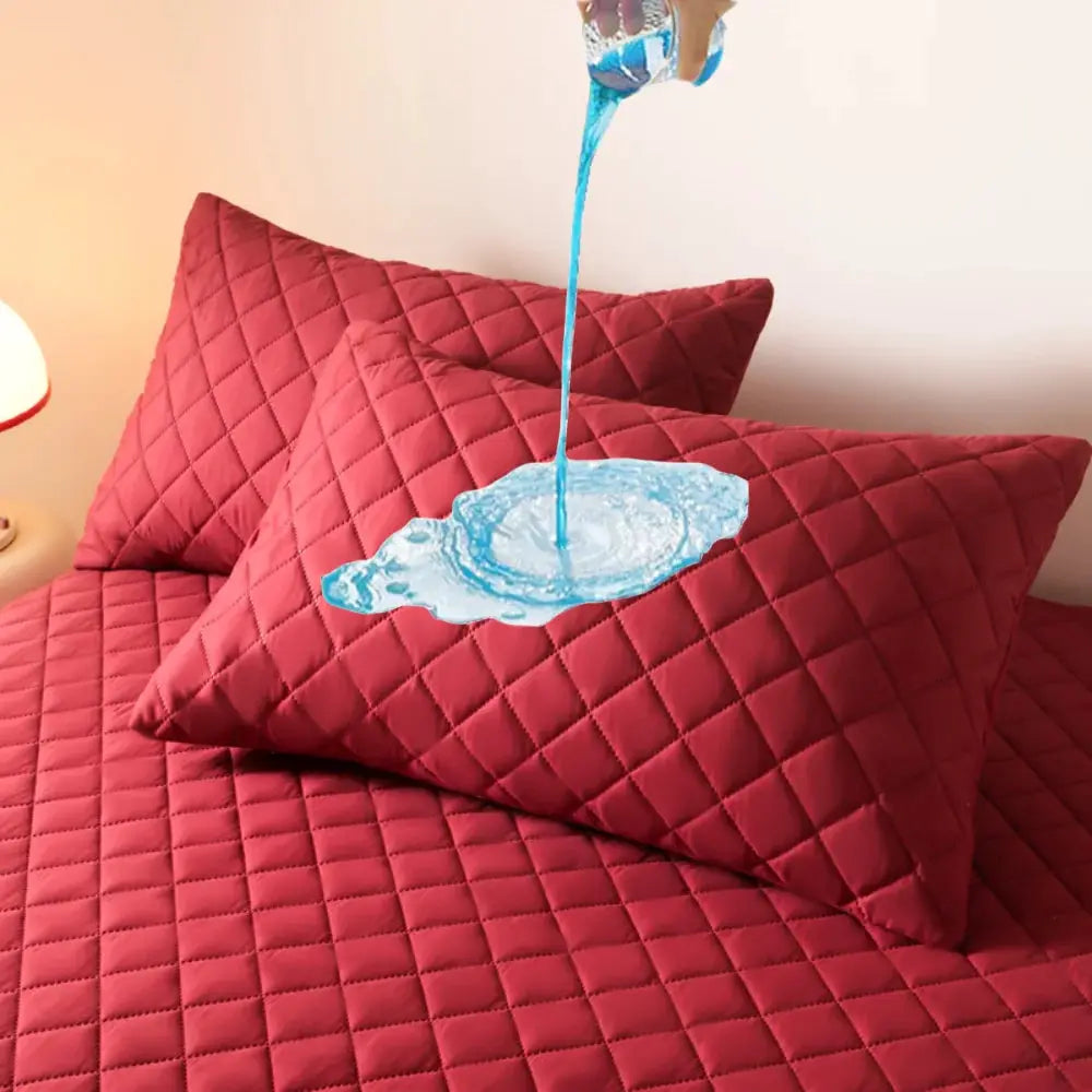 Two red quilted cotton pillowcases, double-deck design