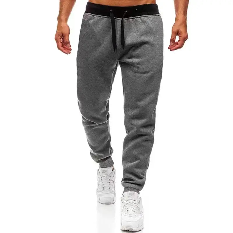 Men's grey joggers sweatpants with black drawstring waistband and tapered cuffs, Simples Market.