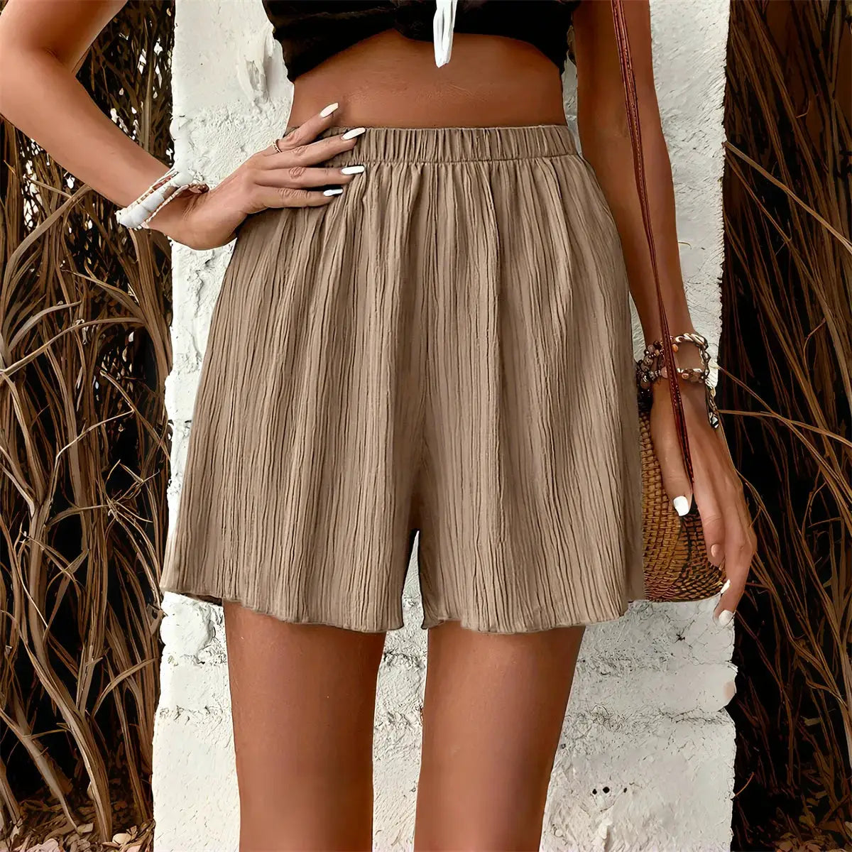 Women's elastic-waist pleated taupe shorts, casual beach-ready style