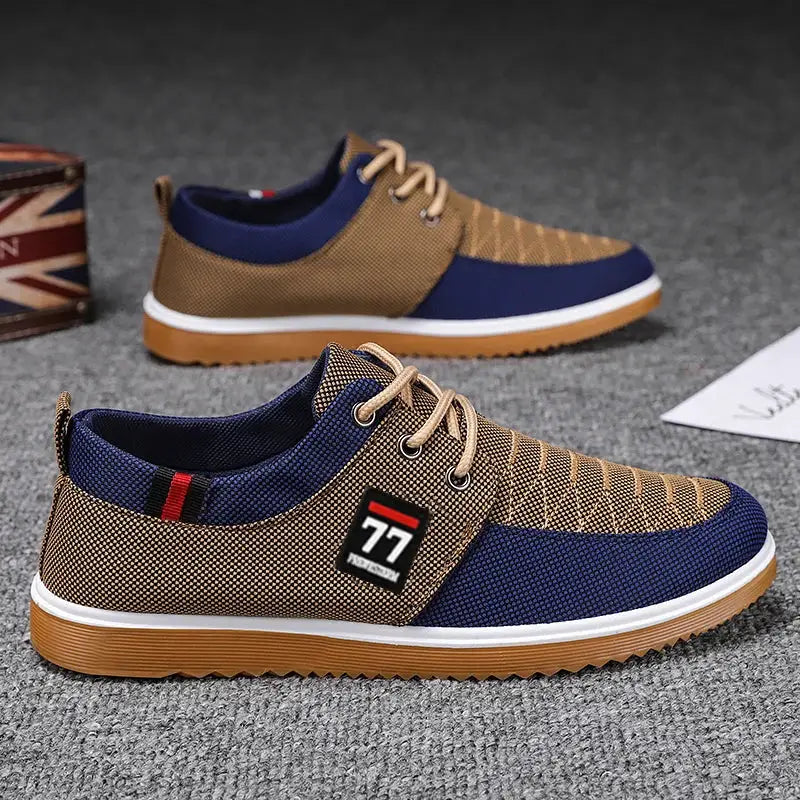 Pair of Simples Market knitted casual sports shoes in brown and navy with gum sole and 77 patch
