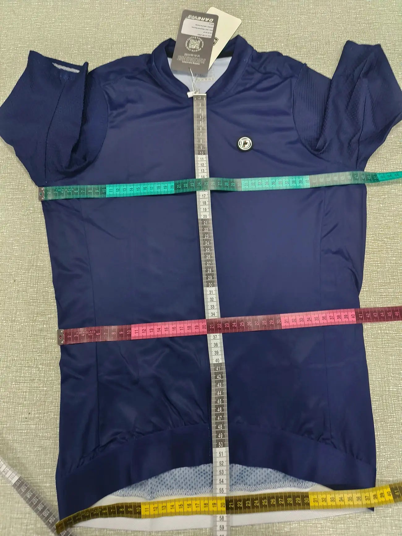 DAREVIE navy blue cycling jersey with short mesh sleeves and small logo patch