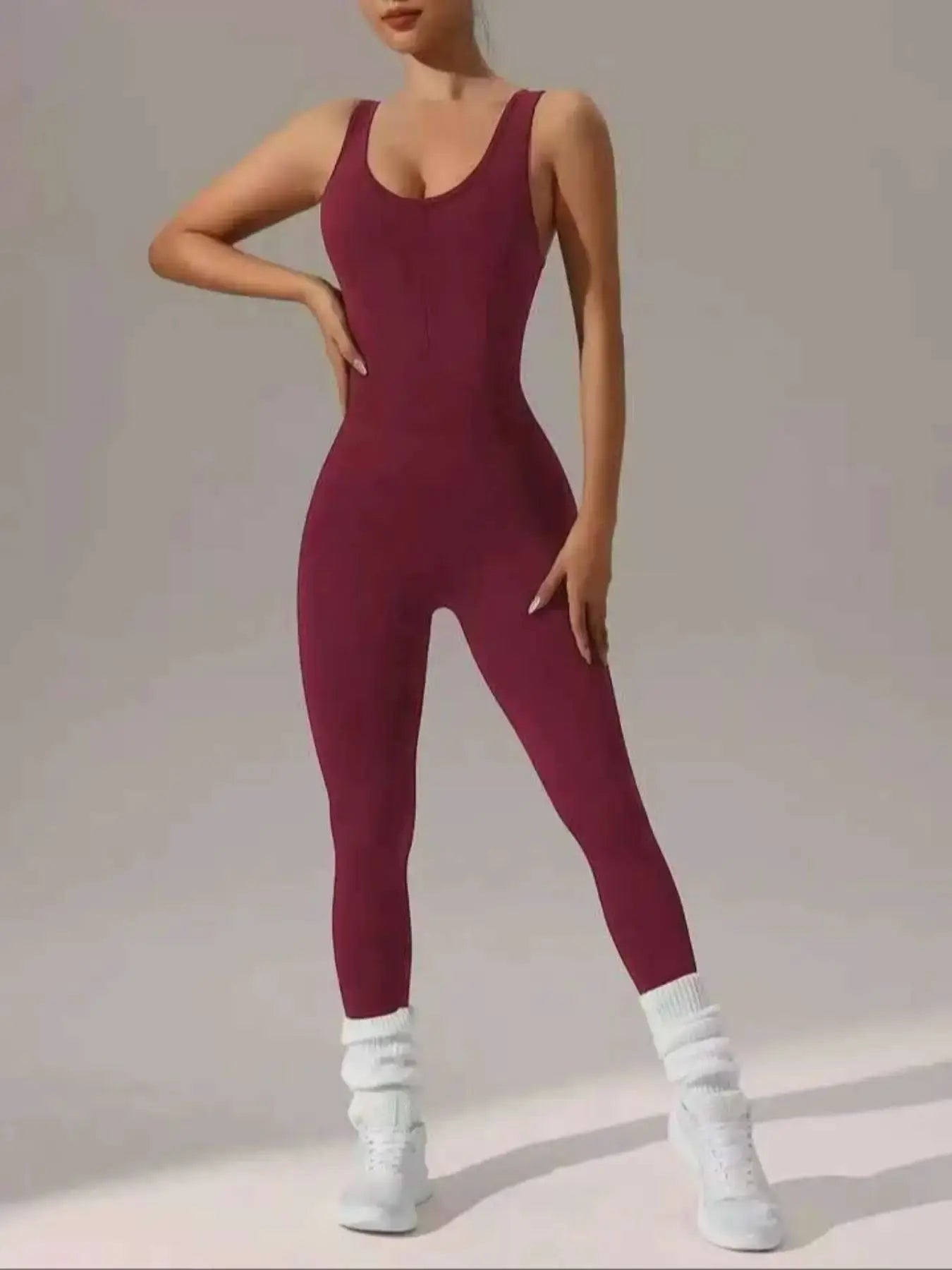 Women's burgundy sleeveless vest jumpsuit with full-length legs