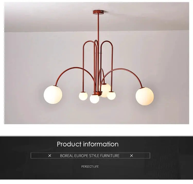 Nordic minimalist pendant light chandelier with red metal arches and white globe bulbs.