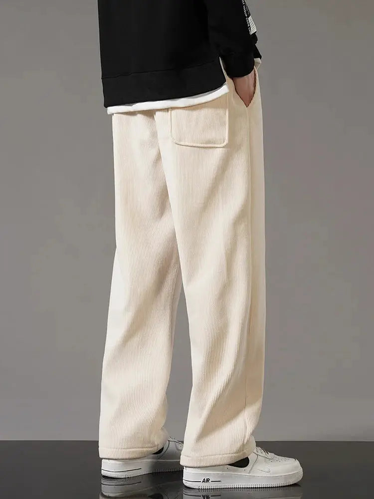 Winter thick warm corduroy sweatpants for men, beige fleece-lined, straight loose fit