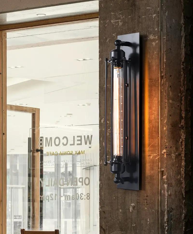 Retro industrial iron wall light by Simples Market, black finish with glass LED tube