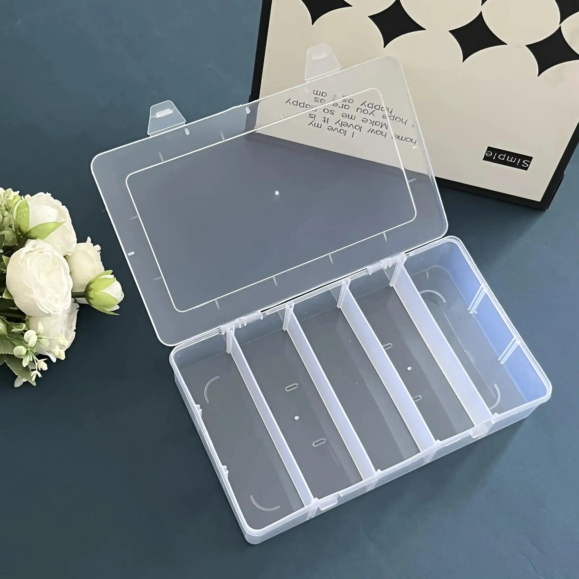 5-compartment transparent tool organizer box by Simples Market for screws and small parts.