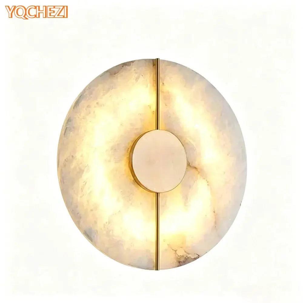 Round alabaster marble wall sconce with a gold vertical divider and central disk, YQCHEZI, Simples Market