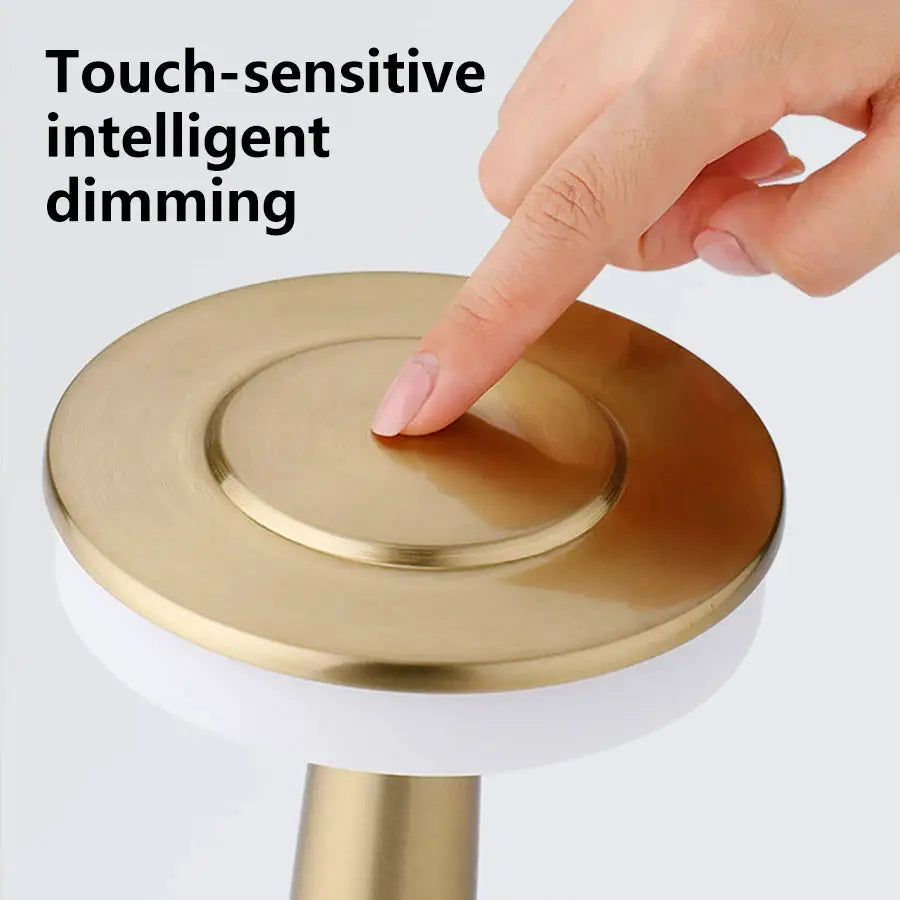 LED table light by Simples Market; gold metal top, white base, touch-dim, rechargeable night light for bar or table