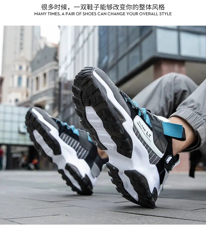Pair of men's sneakers by Simples Market, black and gray running shoes with blue laces and a chunky white sole