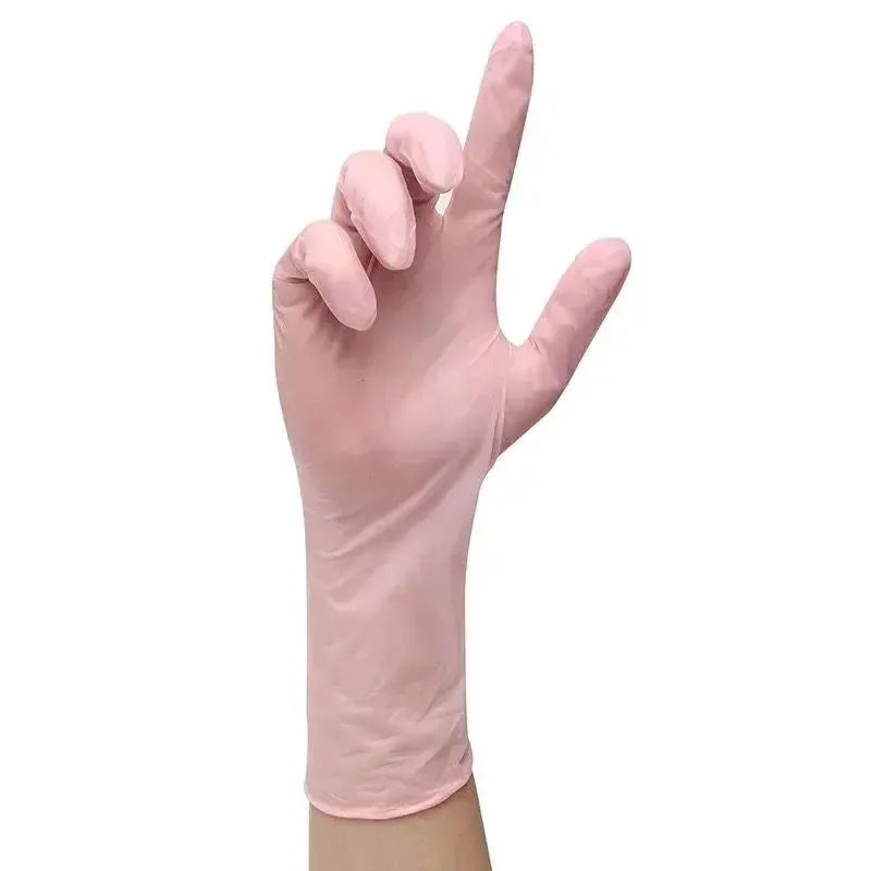 Pink nitrile glove on hand, suitable for household cleaning and kitchen tasks