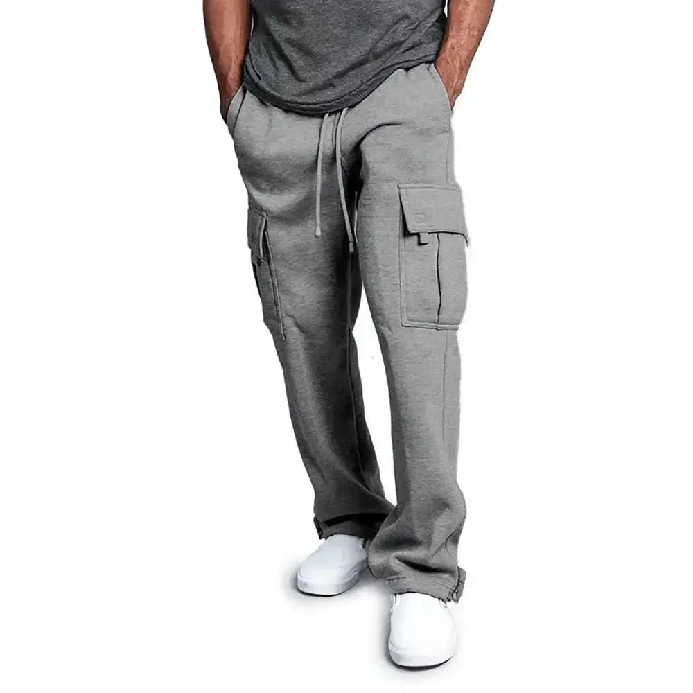 Men's gray cargo sweatpants with drawstring waist and large side cargo pockets in a relaxed jogger fit.