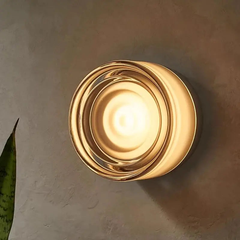 Modern LED wall lamp in smokey grey with amber concentric-ring design wall sconce
