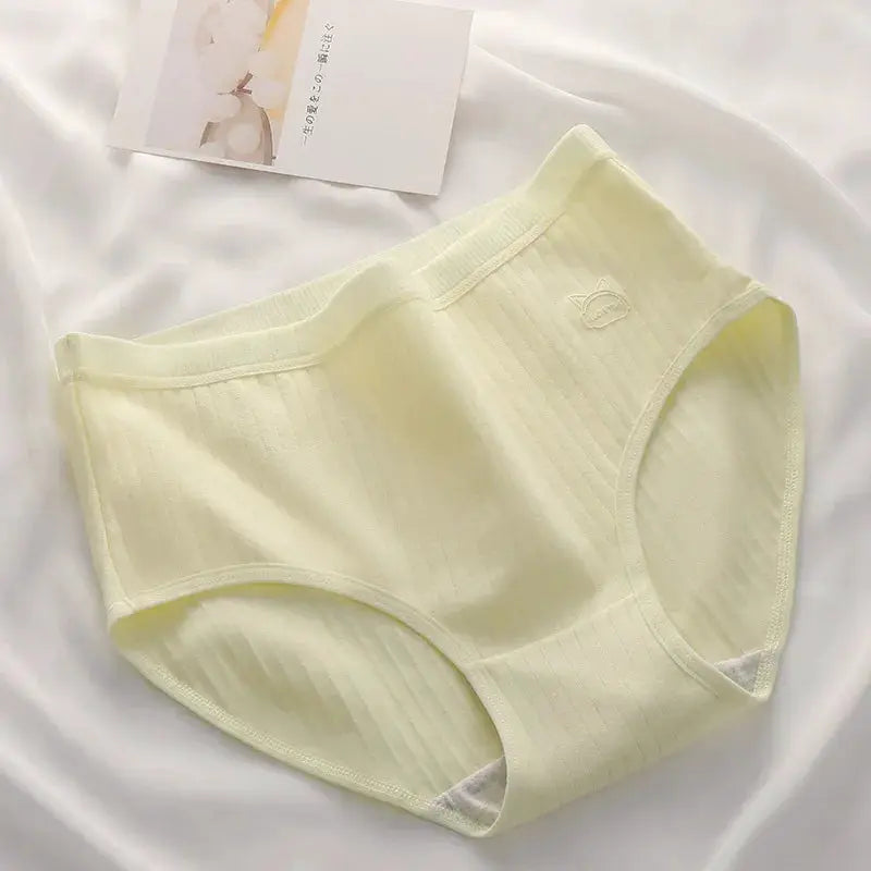 Women's high-waist cotton panties in pale yellow with ribbed fabric