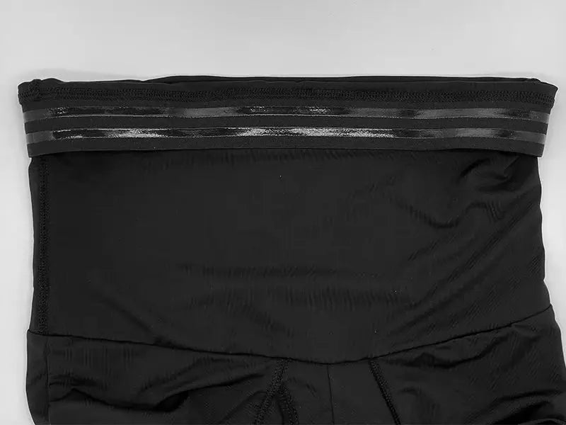 Simples Market men's body shaper compression shorts in black with a high-waist band and glossy stripe detail