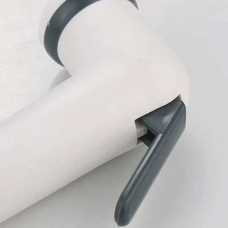 Handheld toilet bidet faucet with adjustable ABS nozzle, white body and gray lever by Simples Market