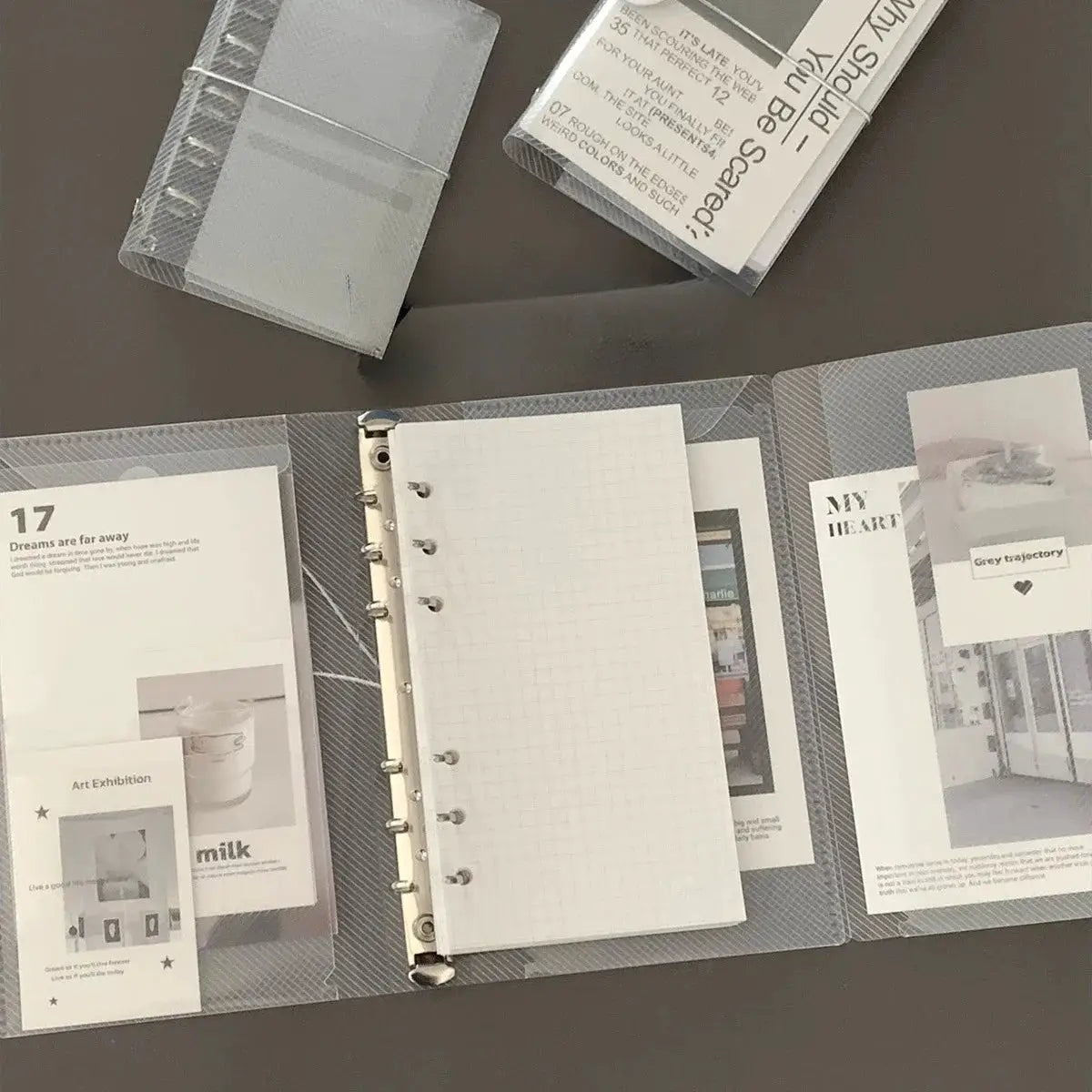 Clear PP three-fold notebook cover for loose-leaf binder with six rings, grid insert and card/photo pockets