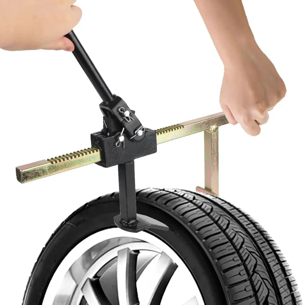 Manual tire changer bead breaker tool with steel guard and clamp mounting a tire on a wheel