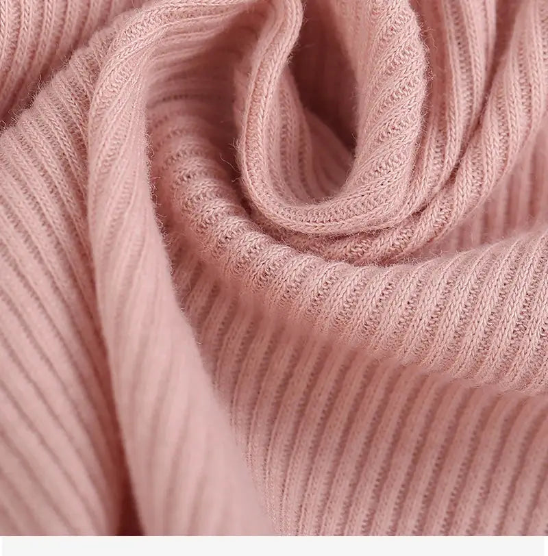 Women's pink ribbed cotton panties close-up showing soft knit texture