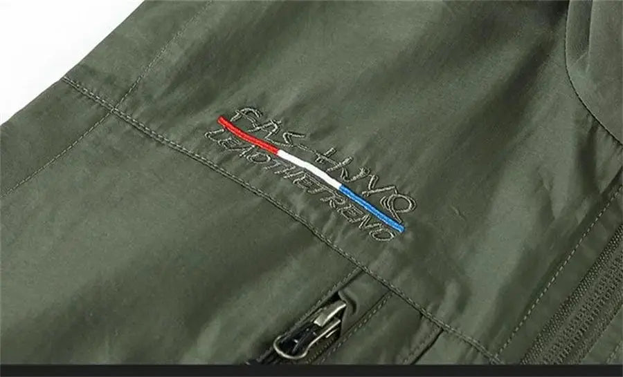 Sleeveless cargo vest by Simples Market in olive green with embroidered logo and tri-color stripe