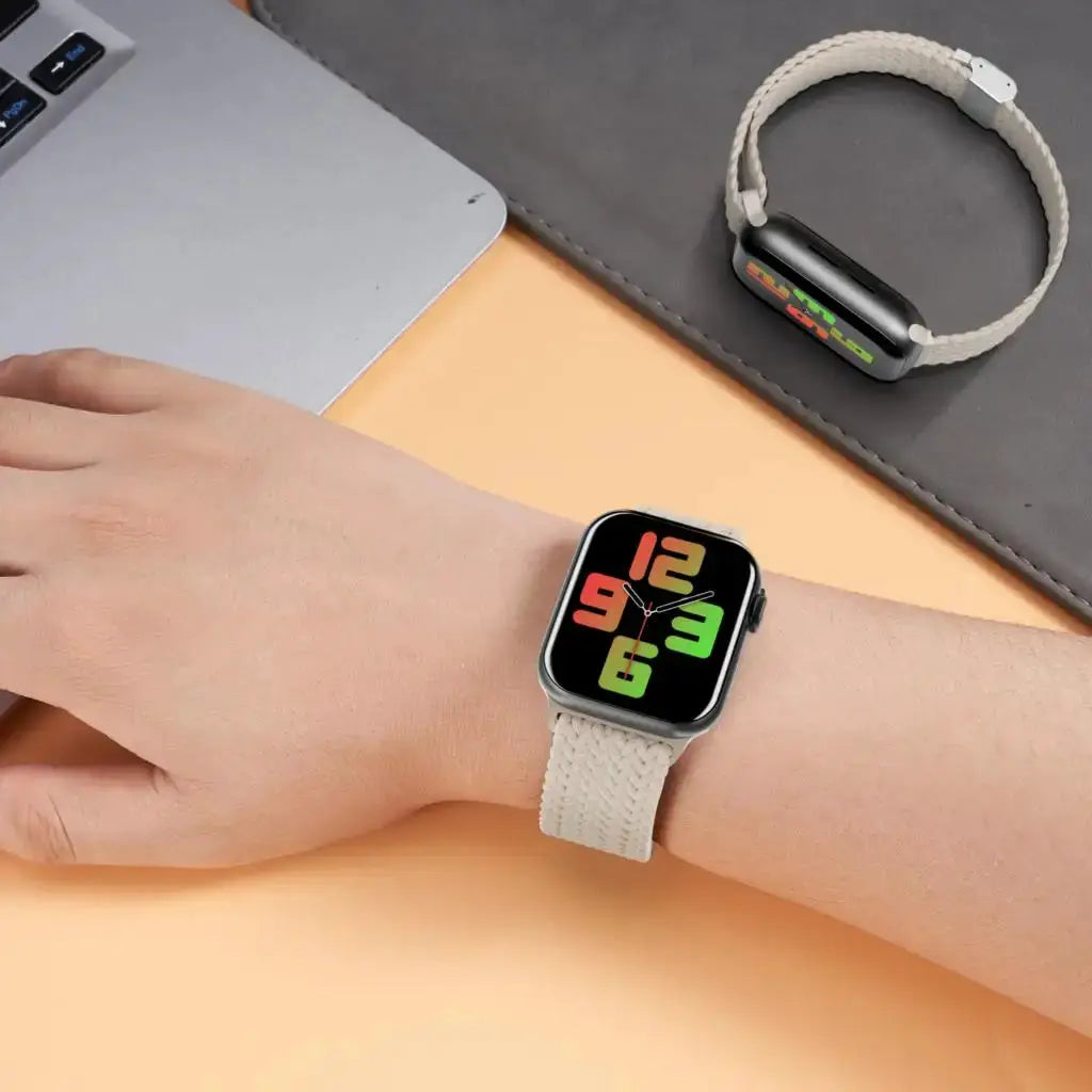 Apple Watch braided solo loop band in beige by Simples Market; compatible with 40–49mm Series watches