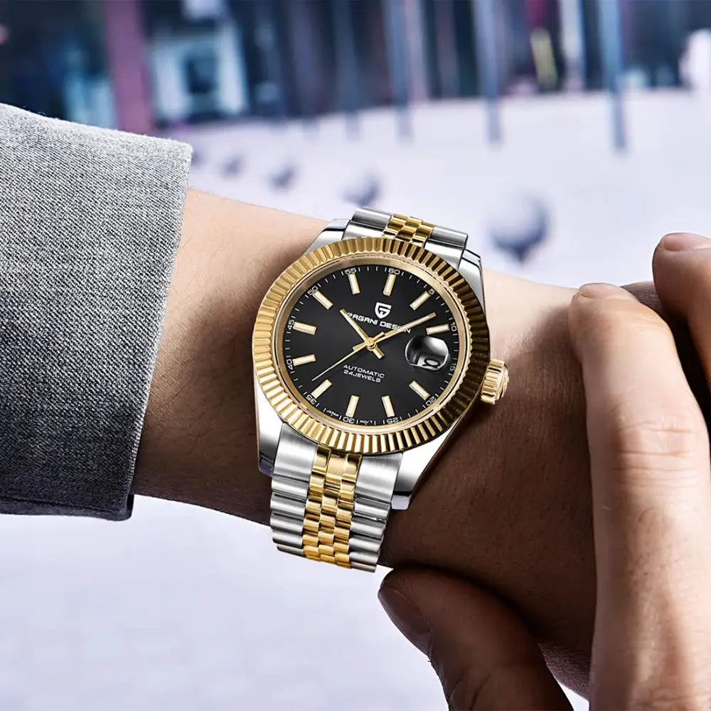 PAGANI DESIGN men's automatic watch with black dial, gold fluted bezel, and two-tone Jubilee bracelet.