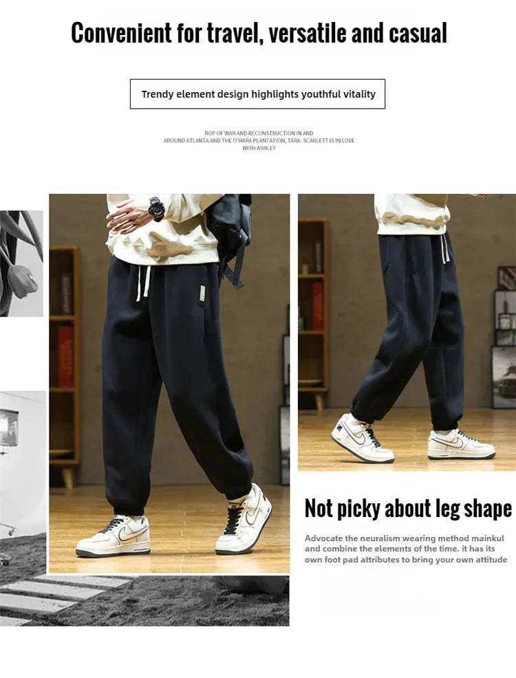 Men's black loose drawstring jogger sweatpants with elastic cuffs