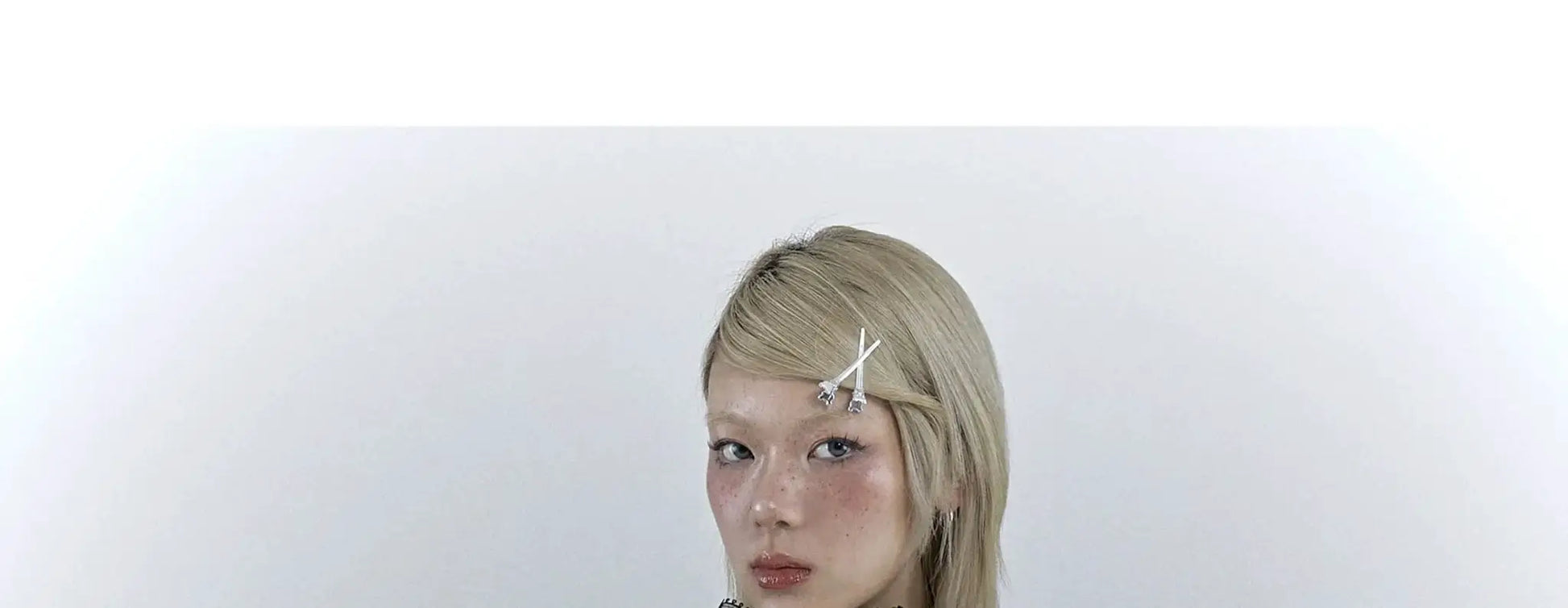 Karrcat Gothic Black Lace Shirt worn by model; blonde hair with white cross hairpins