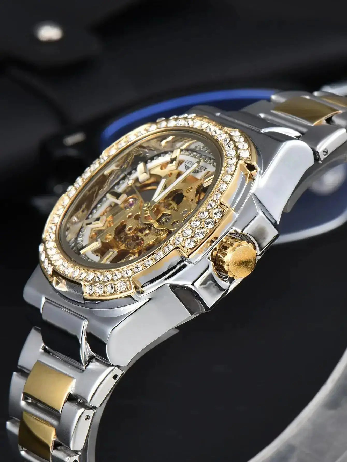 Men's LONGLUX skeleton automatic watch with diamond bezel and two-tone stainless steel bracelet