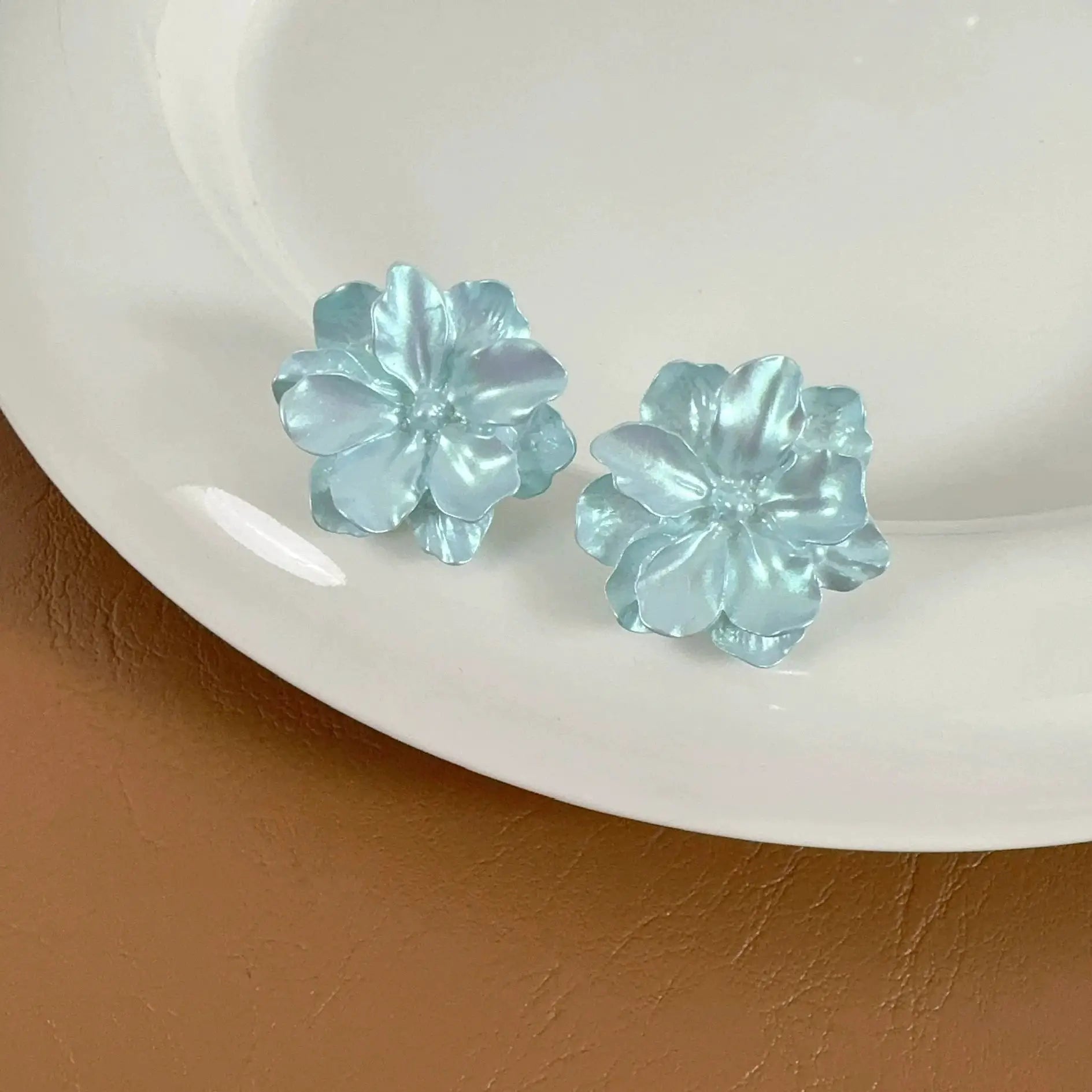 Simples Market pale blue camellia flower stud earrings for women, pair
