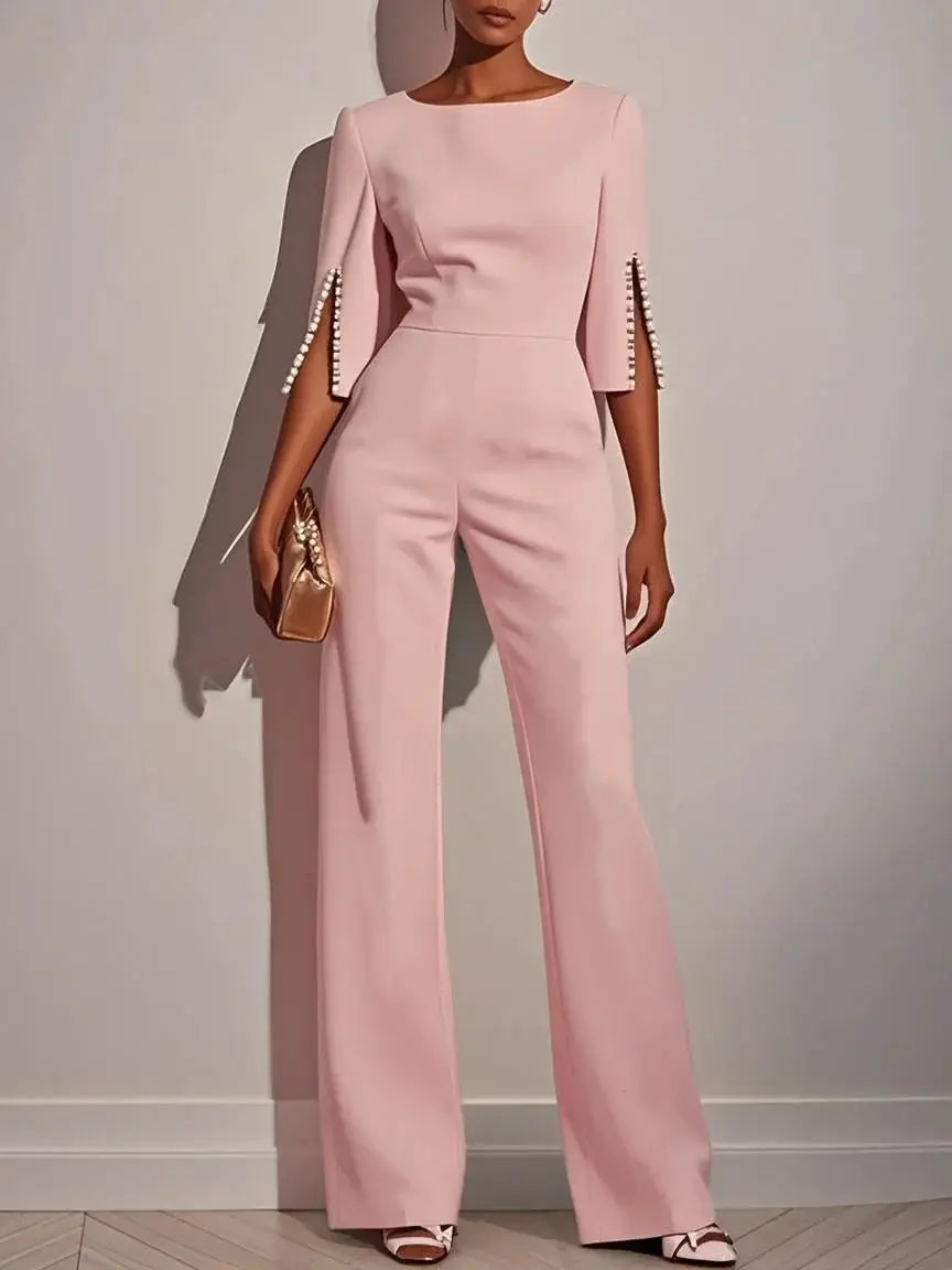 Women's blush pink jumpsuit with beaded sleeve accents, high-waisted, straight-leg fit