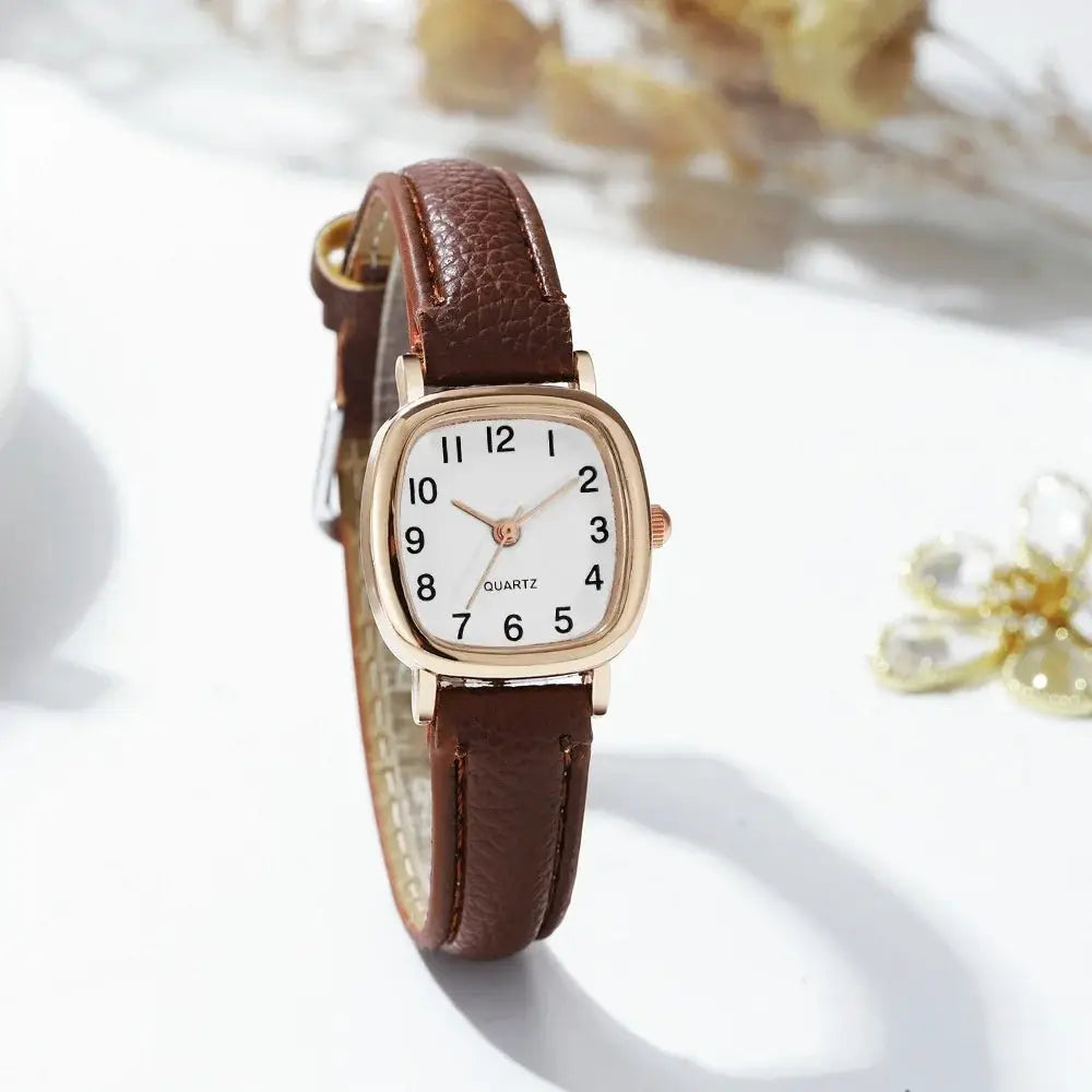 Women's watch Simples Market with brown leather strap, gold-tone case, white dial