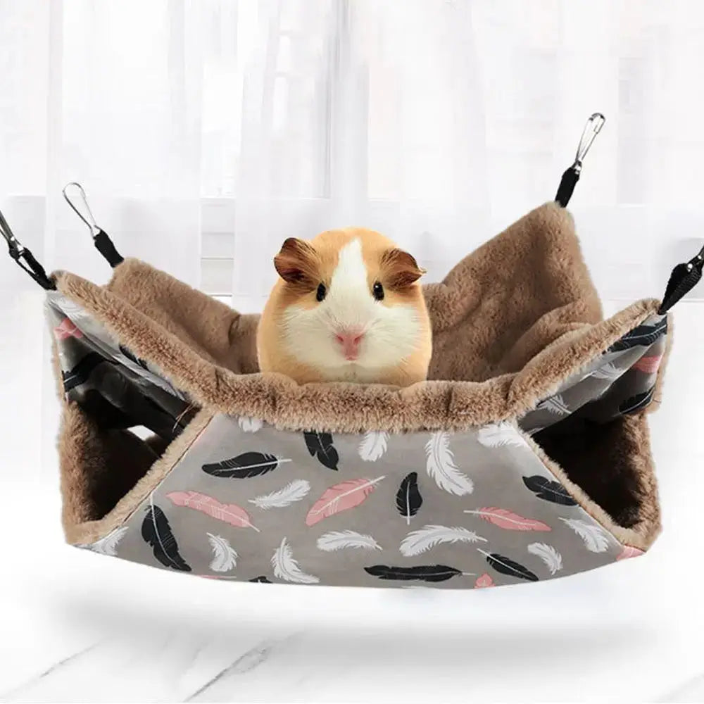 Hamster hammock bed, gray feather-print exterior with tan plush lining, double-layer warm sleeping nest.