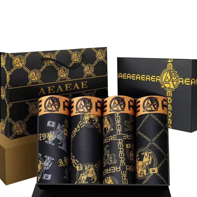 Men's boxer shorts 4-pack in black with gold retro print, boxed set