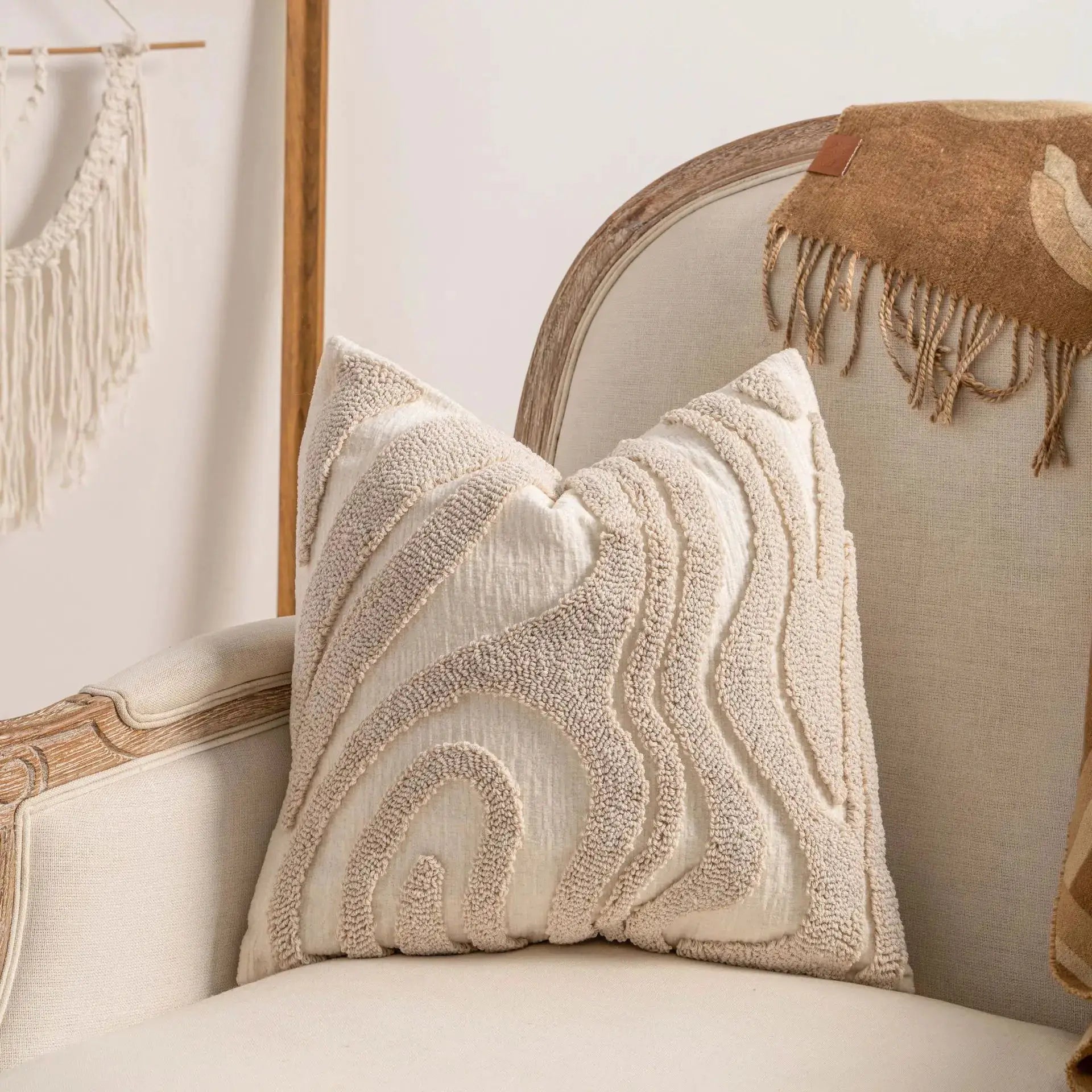 Bohemian beige pillow case with chunky knit texture and fringe