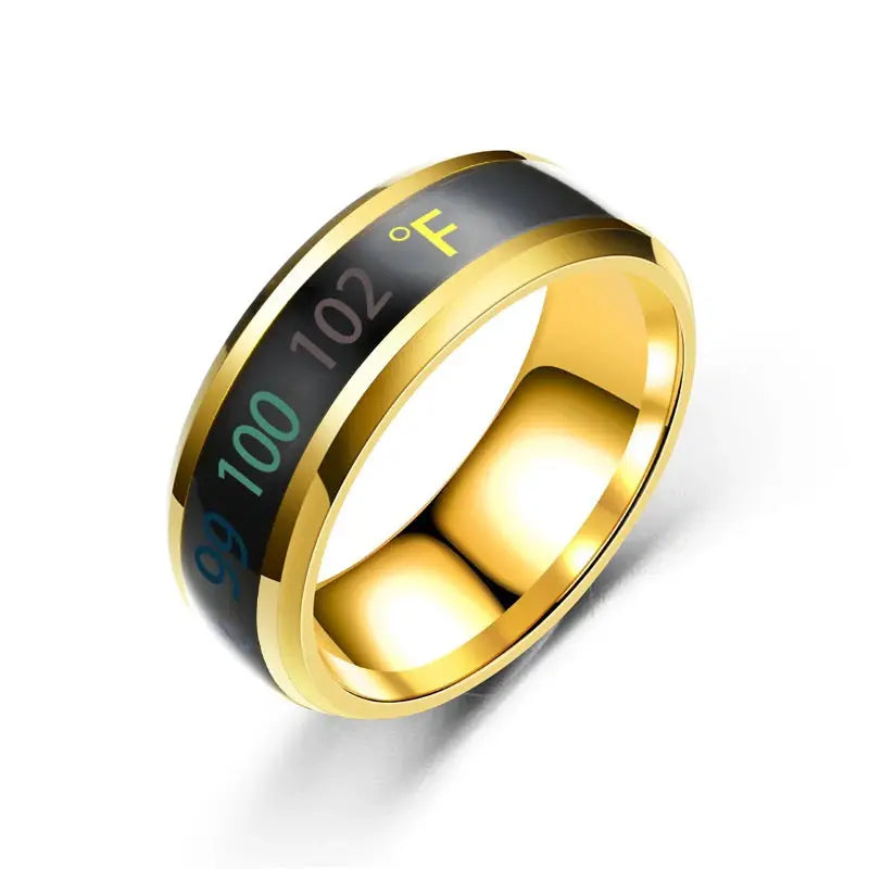 Gold-tone stainless steel ring with black mood-temperature display band and °F markers