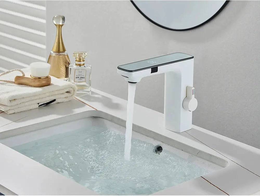 White smart sensor basin faucet with digital display and touchless operation for bathroom sink