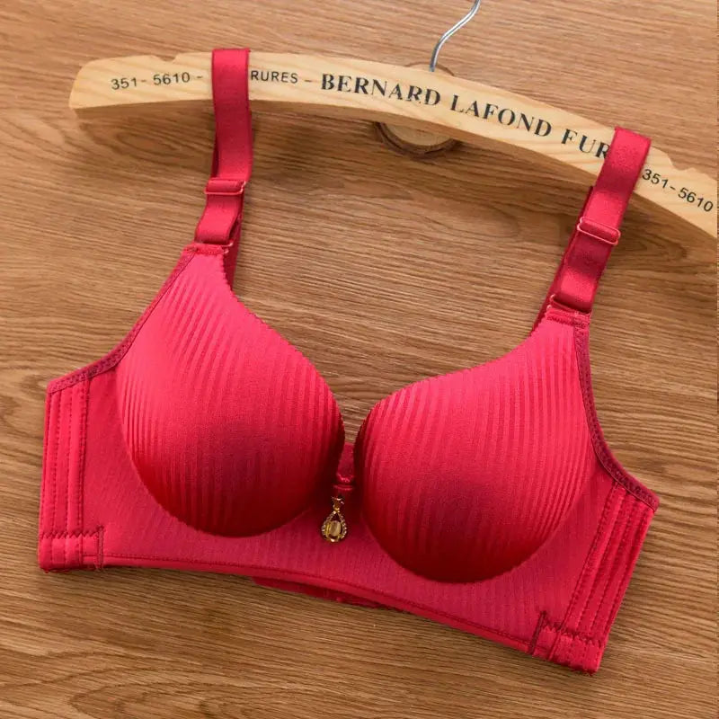Push-up padded bra in red with adjustable straps, wire-free and seamless.