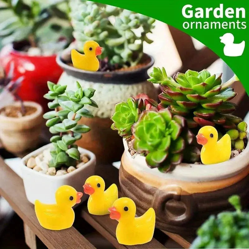 200pcs yellow mini resin ducks for garden decor; bulk tiny duck figures among potted succulents