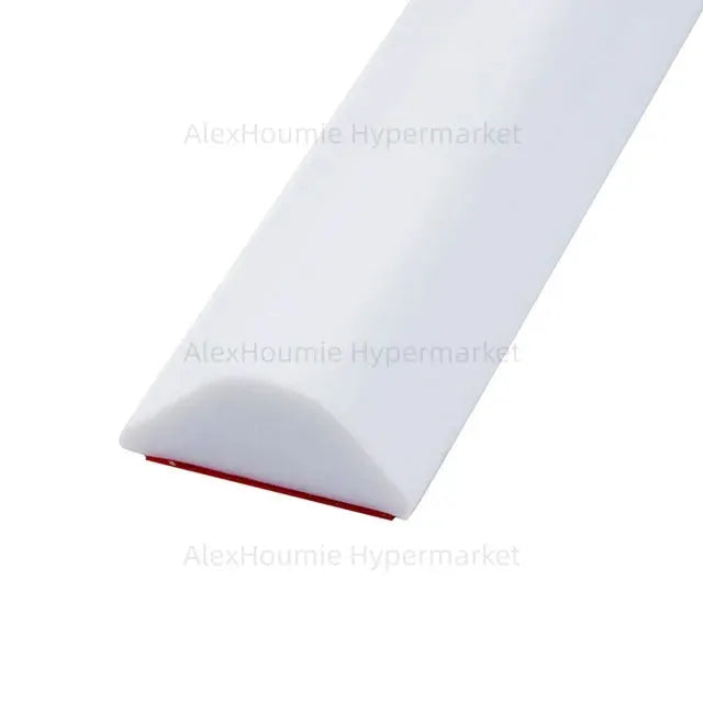 Shower water dam barrier, collapsible white strip with red base for dry–wet separation