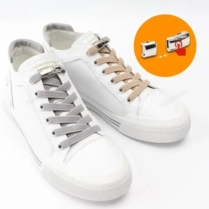 Elastic no-tie sneaker laces by Simples Market; two white sneakers with 8mm widened gray and beige laces press-lock.