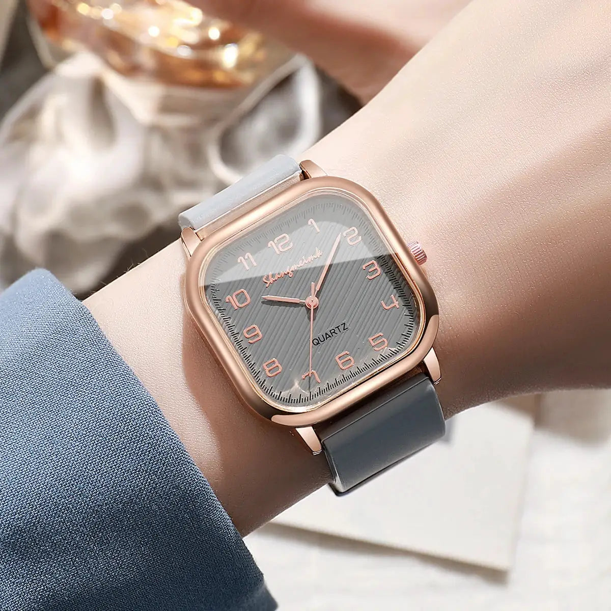 Fashion square women's quartz watch by Simples Market with silicone strap, rose-gold case, gray dial